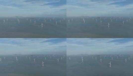 航拍蓝天下的海上风电阵列高清在线视频素材下载