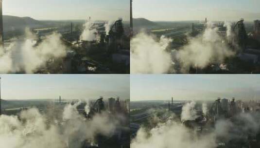 航拍钢铁厂排放的烟雾高清在线视频素材下载