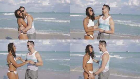 慢动作夫妇在海滩上拥抱高清在线视频素材下载