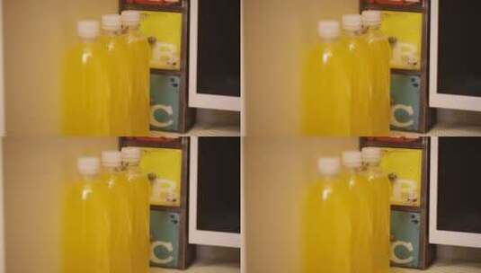 瓶装黄色菠萝果汁橙汁橘子汁办公打字高清在线视频素材下载