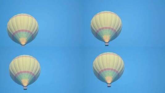 晴空中升起的气球高清在线视频素材下载