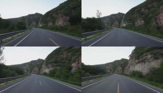 开车视角行驶在公路上  沿途风景高清在线视频素材下载