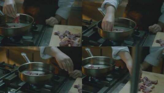厨师用平底锅煎肉的特写镜头高清在线视频素材下载