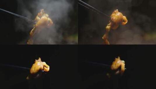 干锅牛蛙热气腾腾冒泡煮沸夹起牛蛙腿超入味高清在线视频素材下载