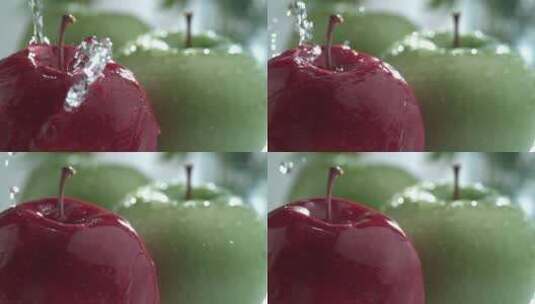水滴落在青苹果红苹果上特写高清在线视频素材下载