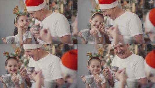 圣诞节女孩和祖父母一起吃饼干高清在线视频素材下载
