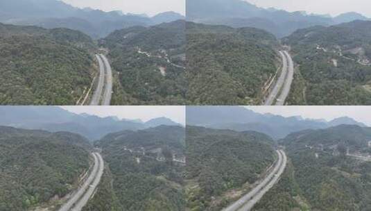 森林高速公路隧道航拍山峰隧道山脉森林道路高清在线视频素材下载