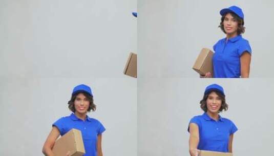 蓝色包裹盒的送货女孩高清在线视频素材下载