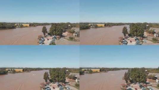 航拍蓝天下的河流高清在线视频素材下载