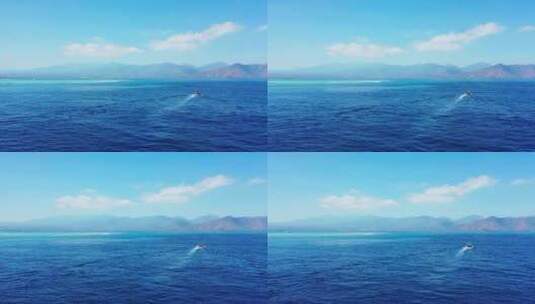 游览船穿过深蓝色的大海高清在线视频素材下载
