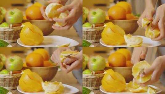 一个人在剥橙子切橙子高清在线视频素材下载