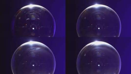 微距蓝光下的泡泡颜色变化高清在线视频素材下载