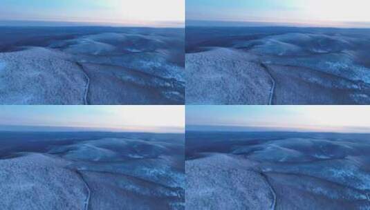 夕阳下林海雪原唯美雾凇高清在线视频素材下载