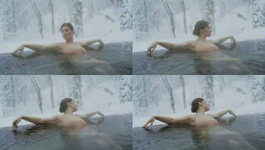 森林中在温泉池中泡澡的女人高清在线视频素材下载
