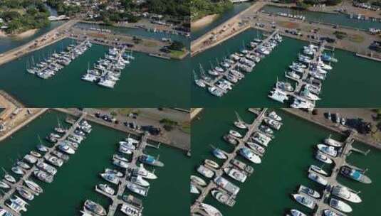 停靠在瓦胡岛北岸码头的船只和游艇。美国夏高清在线视频素材下载