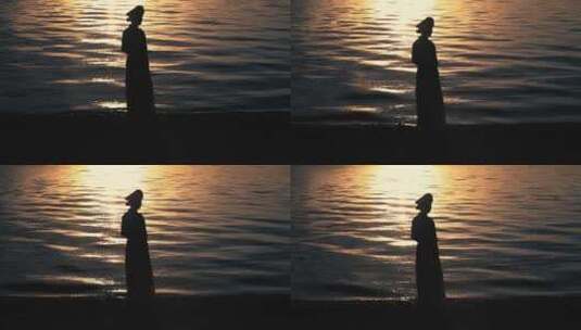 泸沽湖畔的摩梭少女 少女的剪影高清在线视频素材下载
