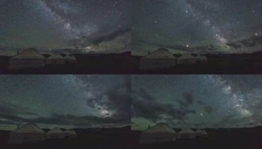 银河在星空中移动，蒙古包营地上空有云高清在线视频素材下载