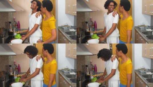 快乐的同性恋夫妇在家准备食物高清在线视频素材下载
