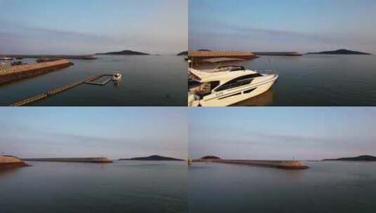 夕阳下海湾避风港渔船自然风光航拍高清在线视频素材下载