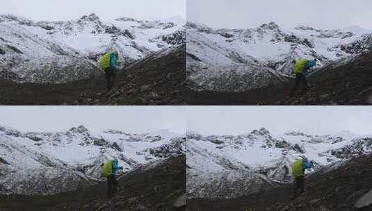 攀登四川甘孜贡巴峰雪山的登山者徒步进山高清在线视频素材下载