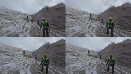 四川甘孜攀登中山峰的登山队在冰川上训练高清在线视频素材下载