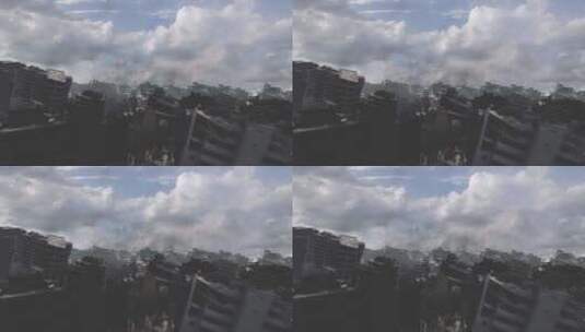 地震或战争后被烟雾、空中摧毁的城市高清在线视频素材下载