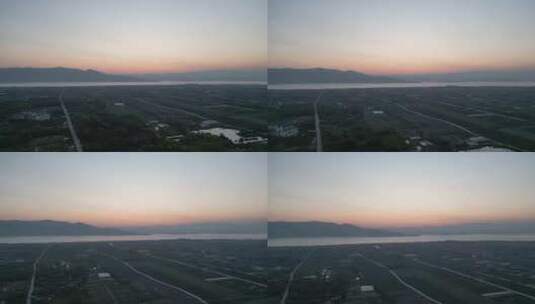 航拍云南大理洱海清晨日出高清在线视频素材下载