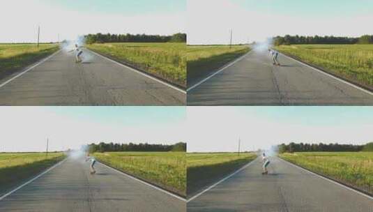 青少年骑着滑板留下一串烟雾高清在线视频素材下载