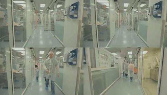 三名科学家走过实验室走廊高清在线视频素材下载