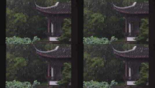 夏季雨中中式园林庭院屋檐雨滴高清在线视频素材下载