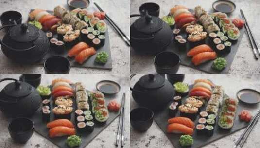 各种不同种的寿司卷放在黑色石板上高清在线视频素材下载