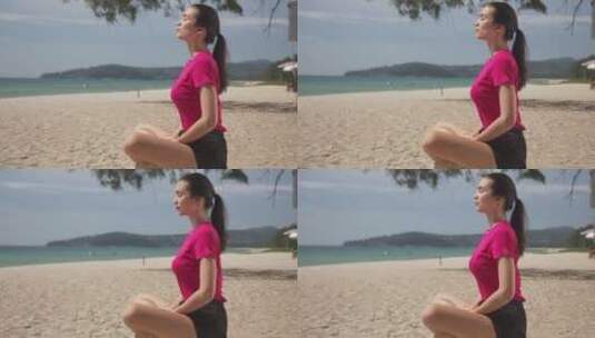 年轻女子在海滩上冥想高清在线视频素材下载