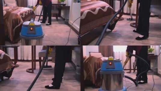 实拍酒店保洁阿姨用吸尘器打扫房间地面卫生高清在线视频素材下载