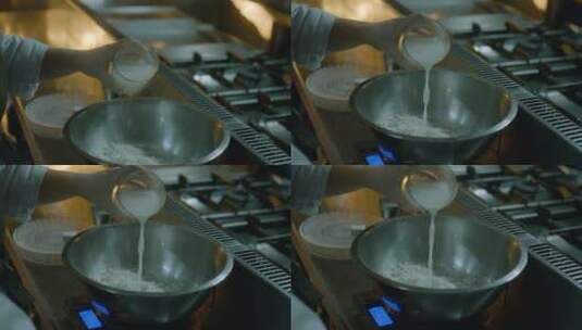 厨师往面盆里倒牛奶高清在线视频素材下载
