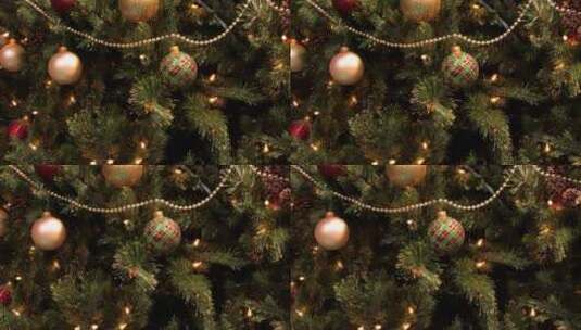 圣诞树上装饰着彩球彩带和装饰物。高清在线视频素材下载