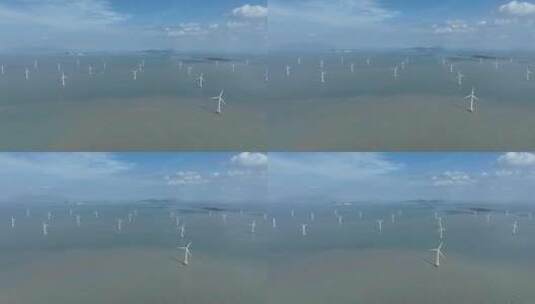 航拍蓝天下的海上风电阵列高清在线视频素材下载