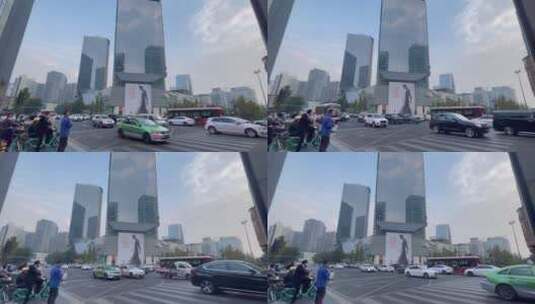 城市街头十字路口车流巨型广告招贴高清在线视频素材下载