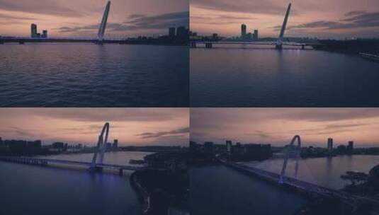 航拍西安浐灞欧亚大桥夕阳夜景高清在线视频素材下载