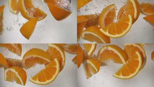 橙子落入水中慢动作高清在线视频素材下载