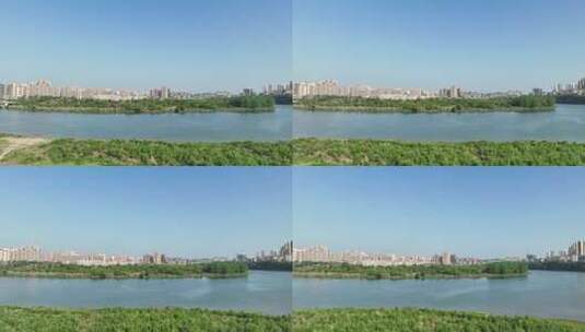 城市江滨河流风景自然景观城市风光航拍高清在线视频素材下载