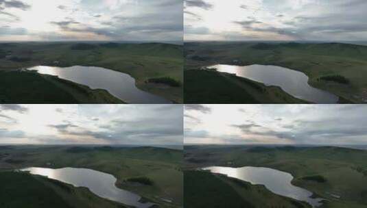 航拍呼伦贝尔山谷湖泊：宝勒高湖高清在线视频素材下载