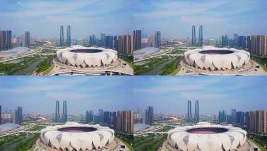 中国浙江杭州奥体中心体育场和杭州之门航拍高清在线视频素材下载