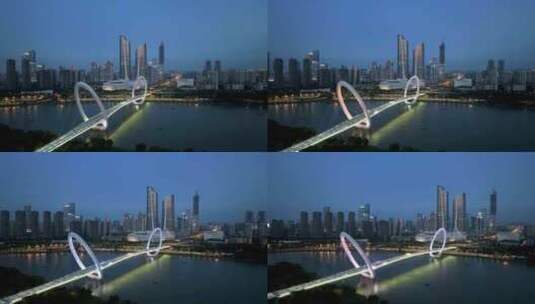 南京河西南京眼步行桥奥体双子塔的夜景风光高清在线视频素材下载