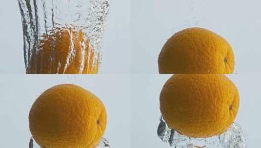 4K橙子掉水里高清在线视频素材下载