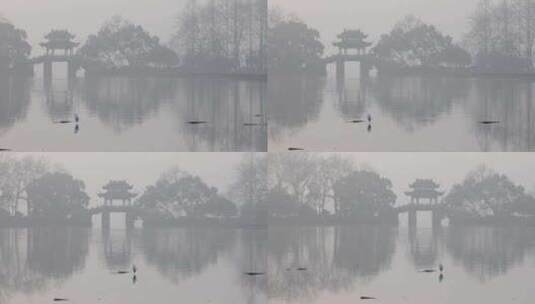 杭州西湖白堤初冬晨雾雾霾高清在线视频素材下载