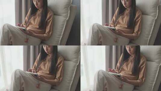 女性沙发上使用手机日常高清在线视频素材下载