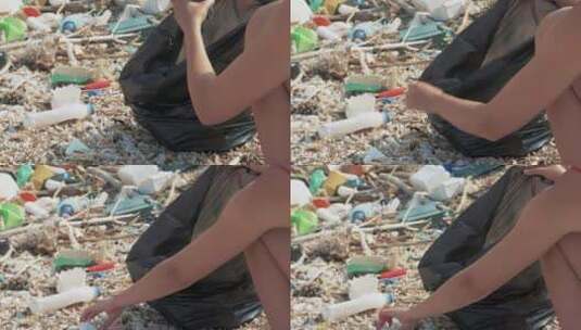 女人在清洁海滩垃圾高清在线视频素材下载