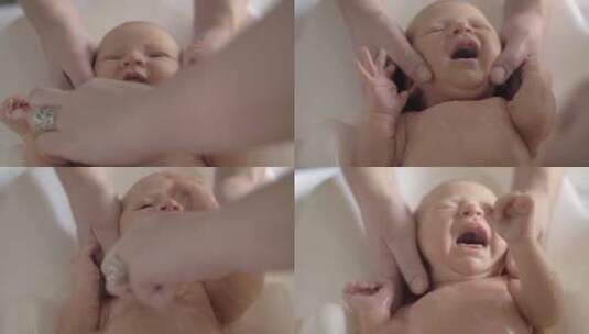 给新生儿洗澡高清在线视频素材下载