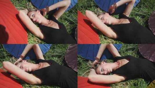 女人躺在草地上高清在线视频素材下载