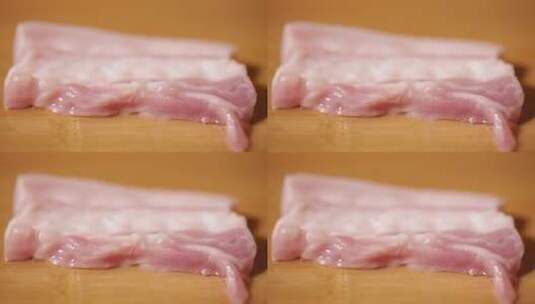 融化的五花肉片腐烂的肉片油脂猪油脂肪高清在线视频素材下载